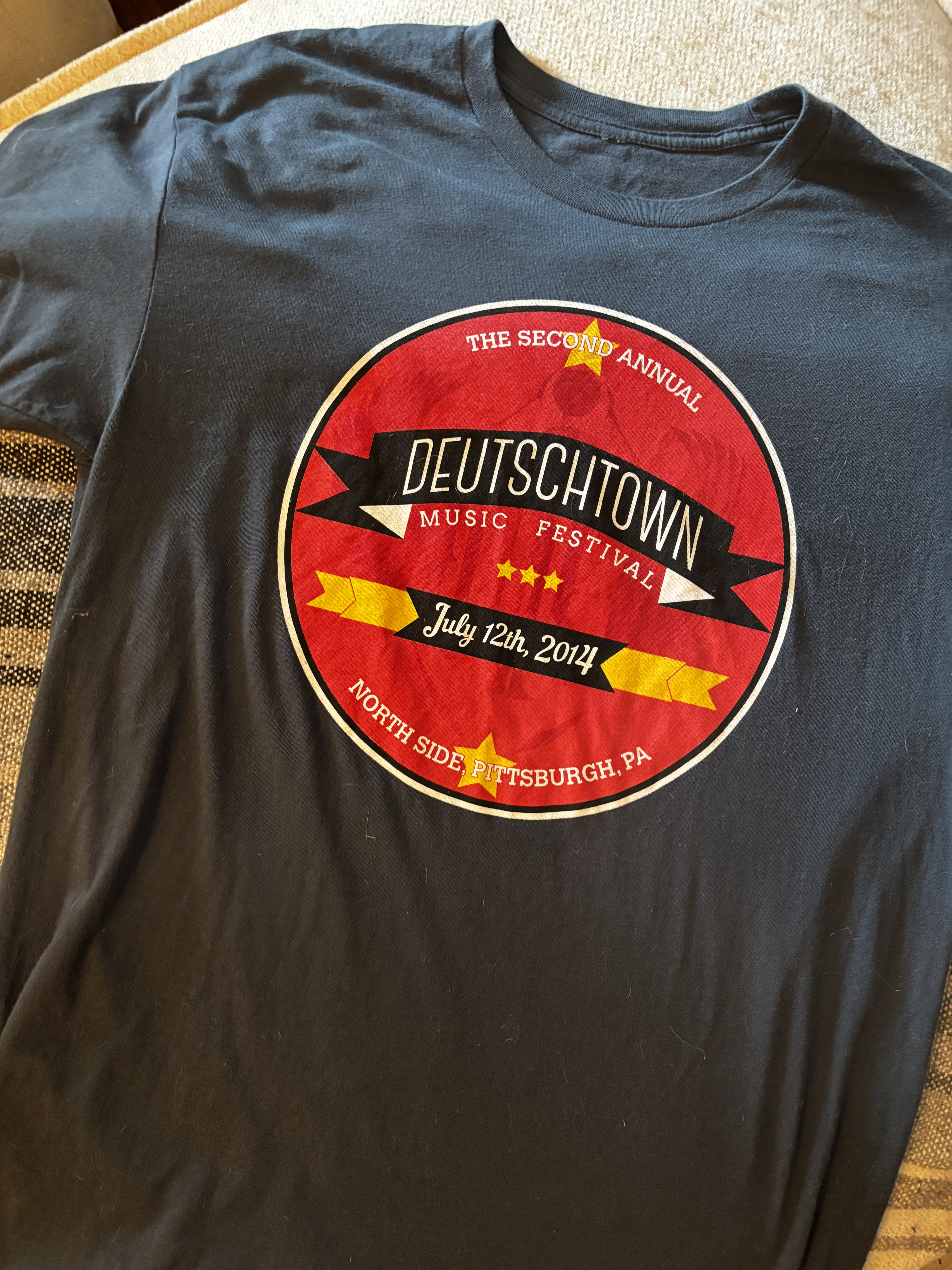 Front of official shirt of the 2014 Deutschtown Music Festival.