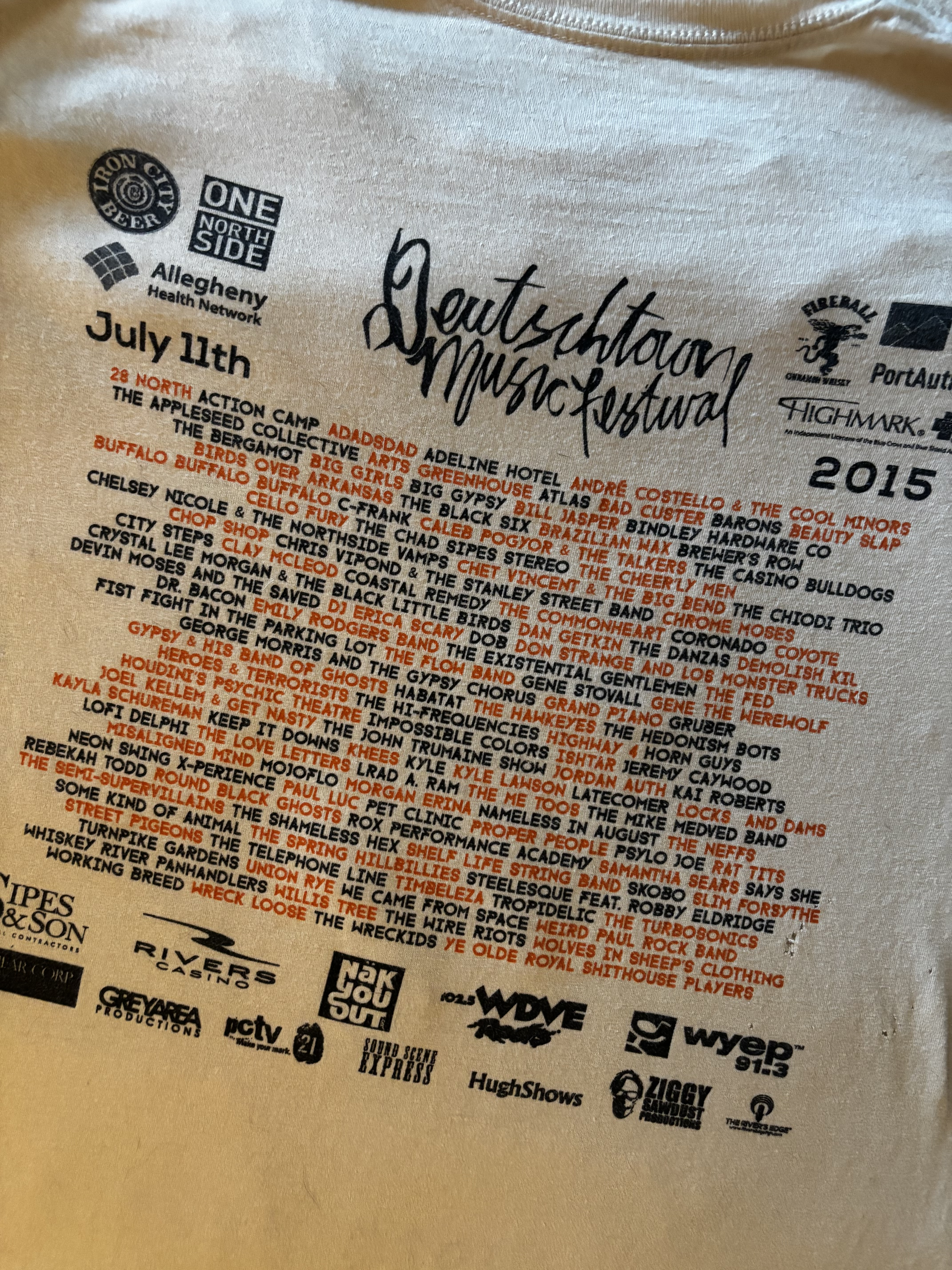 Back of official shirt of the 2015 Deutschtown Music Festival.